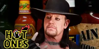 The Undertaker Takes Care of Business While Eating Spicy Wings