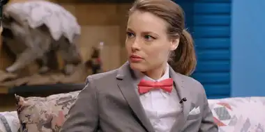 Gillian Jacobs Wears a Gray Checkered Suit and a Red Bow Tie