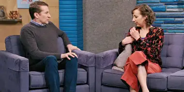 Kristen Schaal Wears Strawberry Colored Pants and a Multicolored Shirt