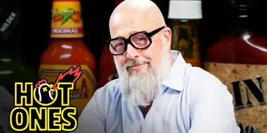 Andrew Zimmern Has a Bucket List Moment While Eating Spicy Wings