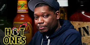 Michael Che Gs Up While Eating Spicy Wings