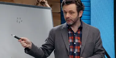 Michael Sheen Wears a Plaid Button Down and Grey Blazer