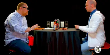 Superfan Brett Baker Grills Sean Evans Over Spicy Wings