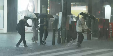 Torrential Rain Causes Flooding at Subway Station