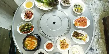 Bone-In Pork Ribs Galbi and a Cluster of Side Dishes of Seoul, South Korea