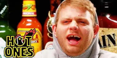 Mac DeMarco Tries to Stay Chill While Eating Spicy Wings