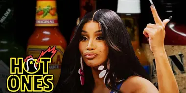 Cardi B Tries Not to Panic While Eating Spicy Wings