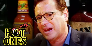 Bob Saget Hiccups Uncontrollably While Eating Spicy Wings